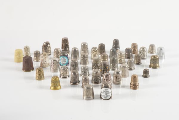 A COLLECTION OF FORTY-NINE THIMBLES (49)