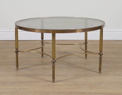 A MID 20TH CENTURY LACQUERED BRASS AND SMOKED GLASS CIRCULAR OCCASIONAL TABLE