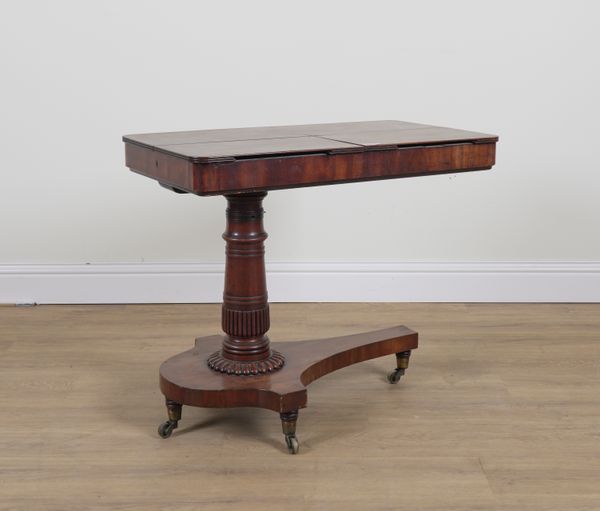 A WILLIAM IV MAHOGANY ADJUSTABLE READING TABLE