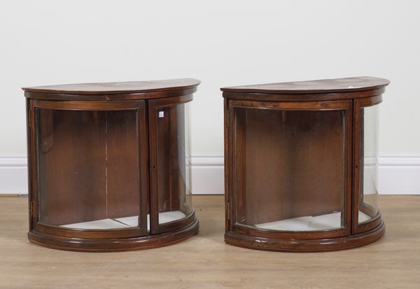 A PAIR OF LATE 19TH CENTURY MAHOGANY BOWFRONT TWO DOOR DISPLAY CABINETS (2)