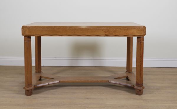 A MID 20TH CENTURY OAK CANTED RECTANGULAR CENTRE TABLE