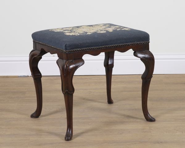 A QUEEN ANNE STYLE WALNUT RECTANGULAR FOOTSTOOL