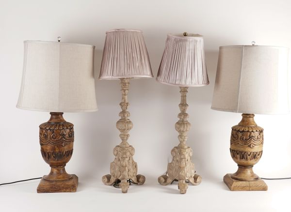 A PAIR OF CARVED HARDWOOD TABLE LAMPS AND A PAIR OF ALTAR CANDLESTICK FORM LAMPS (4)