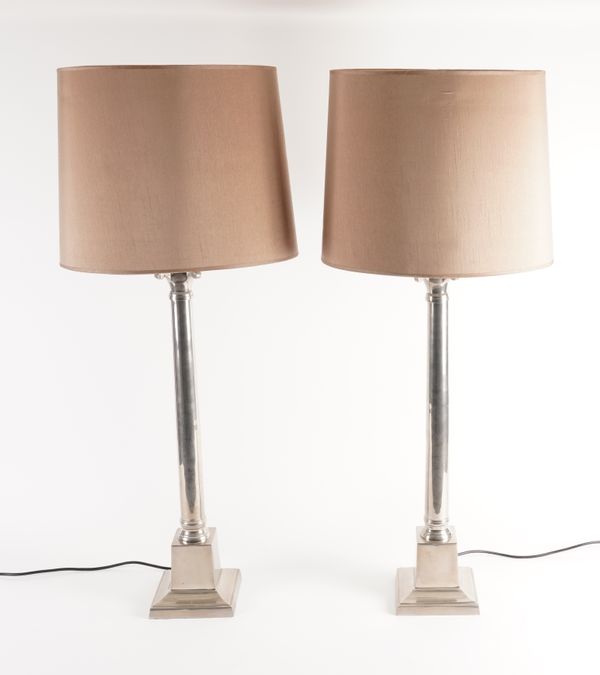 A PAIR OF CHROME IONIC COLUMN TABLE LAMPS AND ANOTHER PAIR OF PATINATED METAL LAMPS (4)