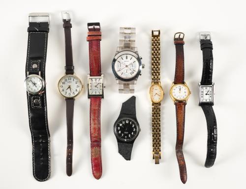 EIGHT FASHION WATCHES (8)