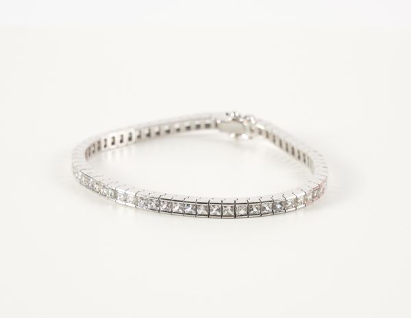 A WHITE GOLD AND COLOURLESS SAPPHIRE LINE BRACELET (2)