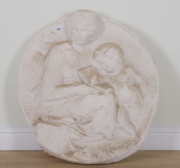 AFTER BUONARROTI MICHELANGELO: A RELIEF CAST PLASTER PLAQUE DEPICTING A MOTHER WITH CHILDREN