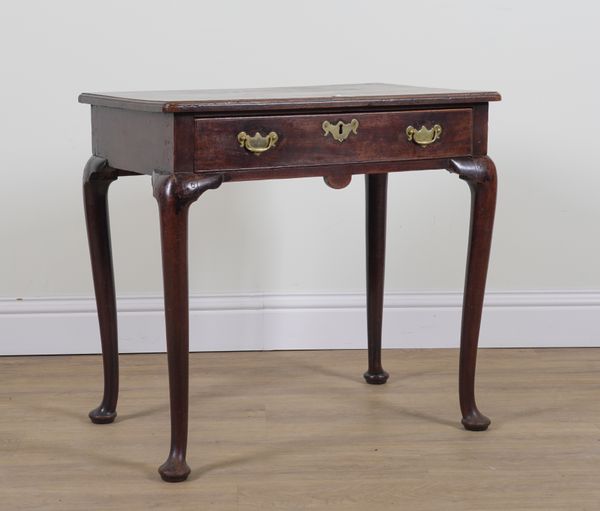 A GEORGE II MAHOGANY SINGLE DRAWER SIDE TABLE ON PAD FEET