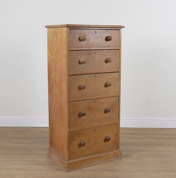 A LATE VICTORIAN TALL NARROW PINE FIVE DRAWER CHEST