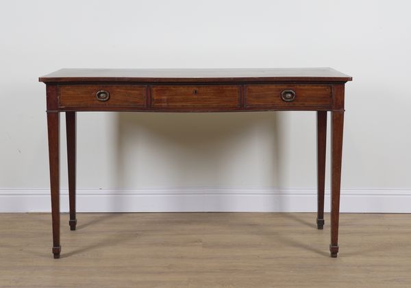 A GEORGE III MAHOGANY SERPENTINE THREE DRAWER SERVING TABLE