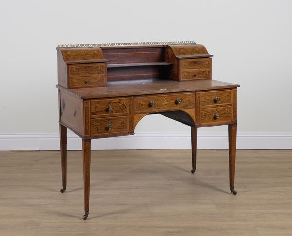 AN EDWARDIAN MARQUETRY INLAID ROSEWOOD CARLTON HOUSE DESK