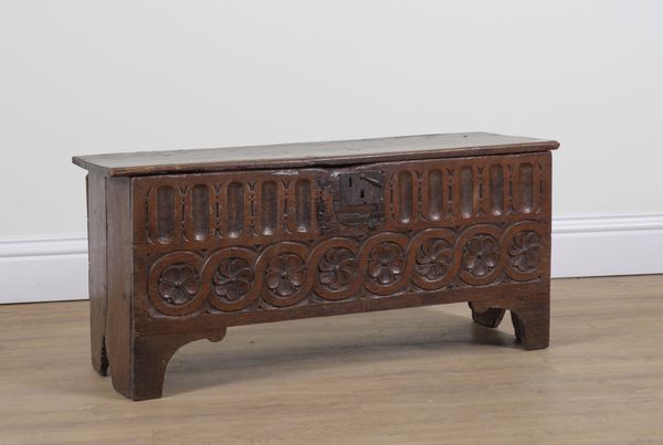 A 17TH CENTURY AND LATER OAK PLANK COFFER