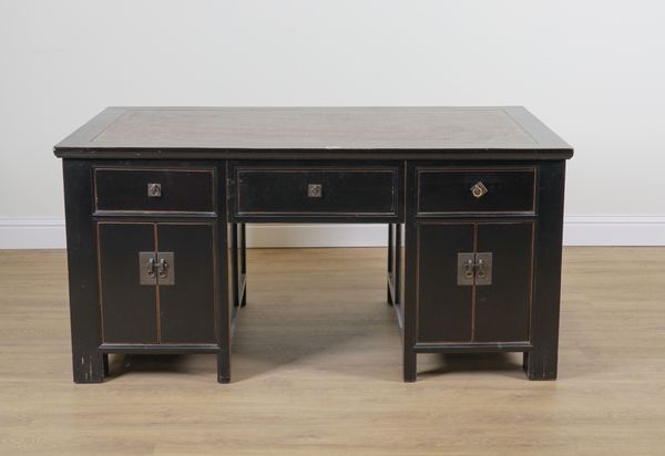 OKA; A BLACK LACQUERED NINE DRAWER PARTNERS PEDESTAL DESK