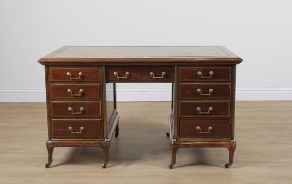 A 19TH CENTURY FRENCH BRASS INLAID MAHOGANY NINE DRAWER WRITING DESK