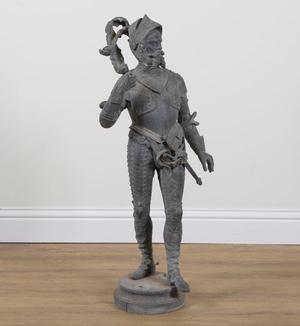 A FRENCH SPELTER FIGURE OF A STANDING KNIGHT