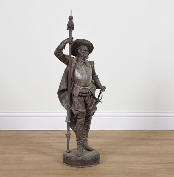 A FRENCH SPELTER FIGURE OF A STANDING CAVALIER