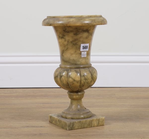 AN ITALIAN ALABASTER BALUSTER URN