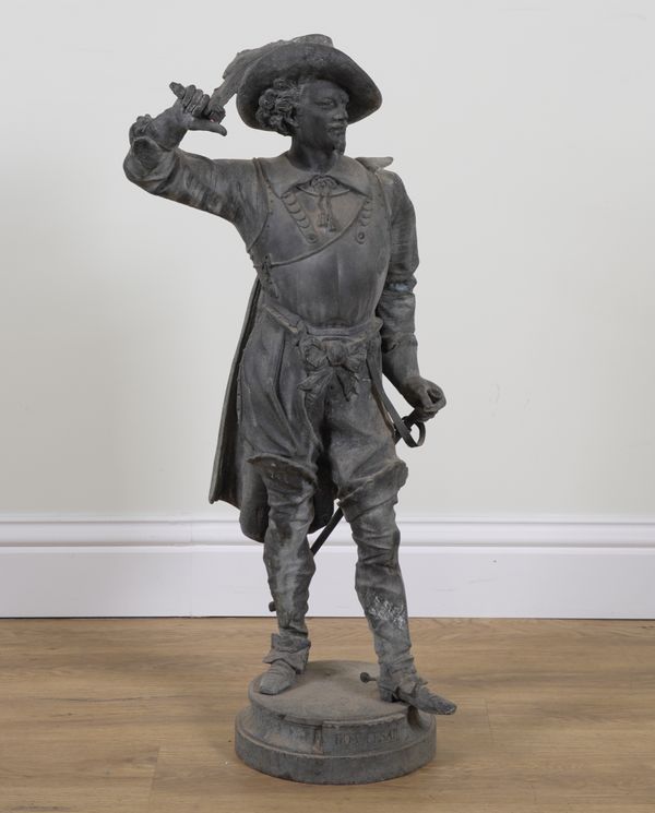 A FRENCH CAST SPELTER FIGURE OF A STANDING CAVALIER