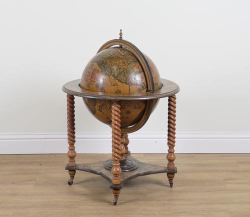A 20TH CENTURY GLOBE DRINKS CABINET
