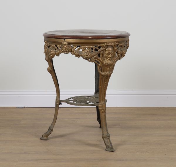 A LATE VICTORIAN GOLD PAINTED CIRCULAR CAST IRON PUB TABLE