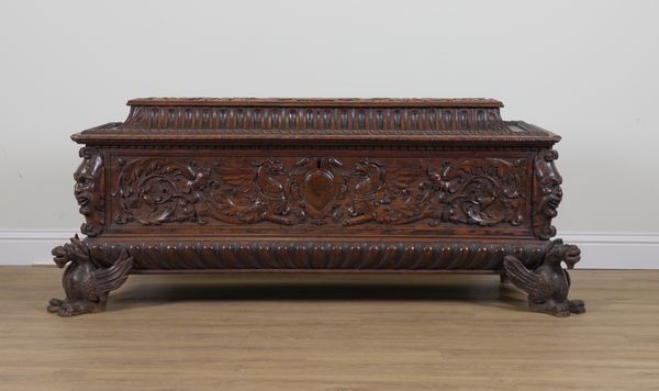 AN 18TH CENTURY ITALIAN CARVED WALNUT CASSONE