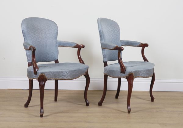 A PAIR OF GEORGE III MAHOGANY UPHOLSTERED OPEN ARMCHAIRS (2)