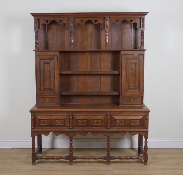 A CHARLES II STYLE OAK DRESSER