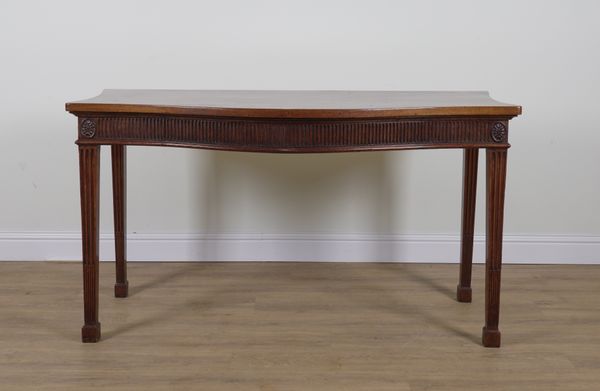 A GEORGE III MAHOGANY SERPENTINE SERVING TABLE