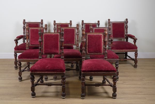 IN THE MANNER OF LAMB OF MANCHESTER; A SET OF NINE CARVED AND TURNED OAK FRAMED DINING CHAIRS (9)