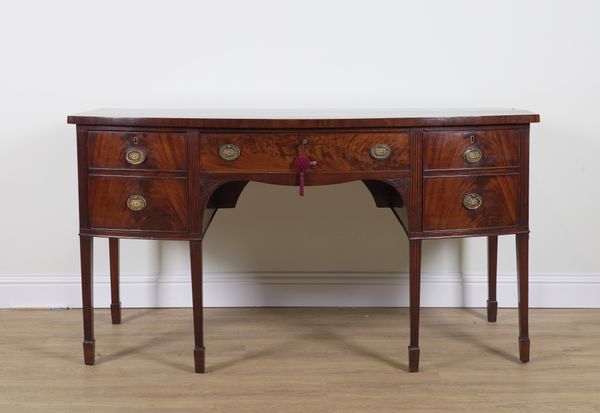 W WILLIAMSON & SONS GUILDFORD;  A GEORGE III ROSEWOOD BANDED MAHOGANY BOWFRONT SIDEBOARD