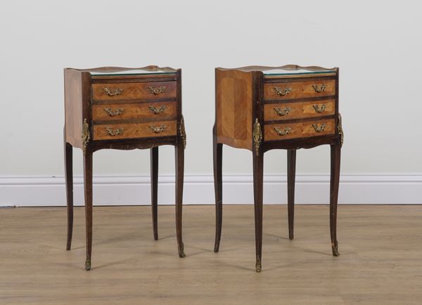 A PAIR OF LOUIS XV STYLE GILT METAL MOUNTED MARQUETRY INLAID WALNUT BEDSIDE TABLES (2)