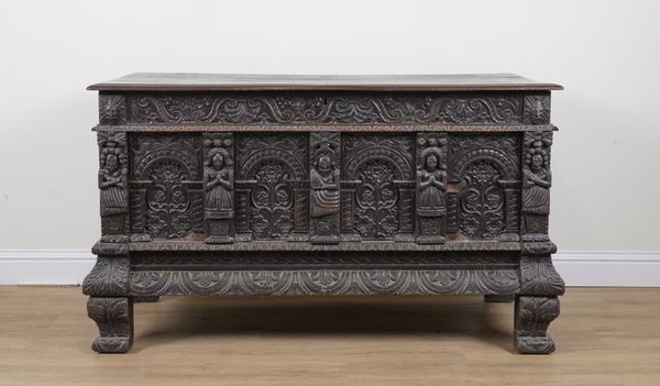 A 17TH CENTURY CARVED OAK CHEST