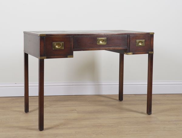 A CAMPAIGN STYLE BRASS BOUND MAHOGANY THREE DRAWER WRITING TABLE