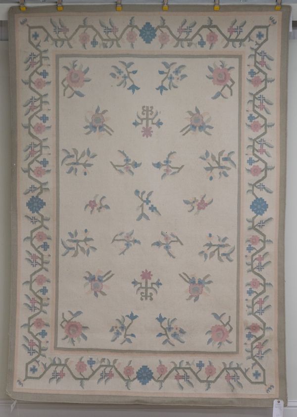 AN INDIAN FLATWEAVE CARPET