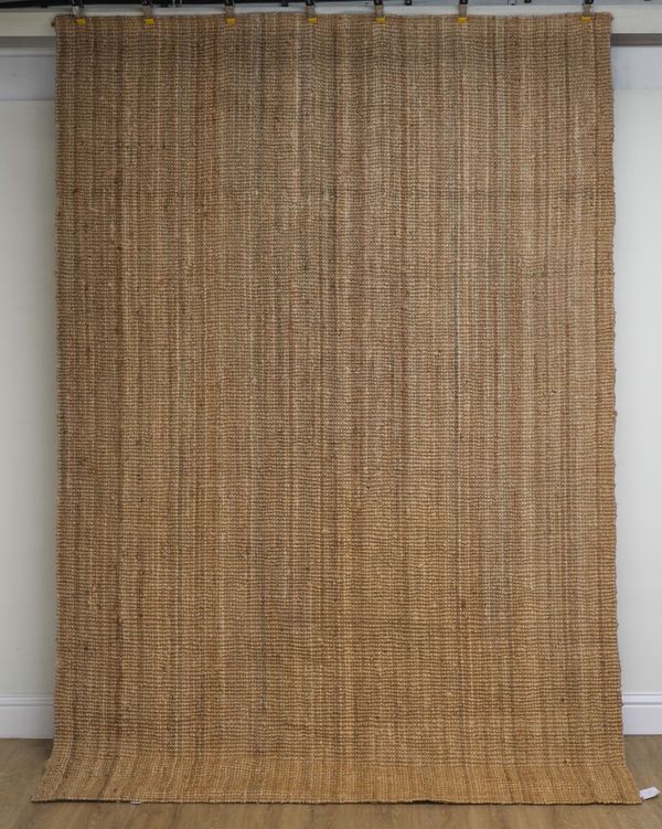 A JUTE FLATWEAVE FLOOR COVERING