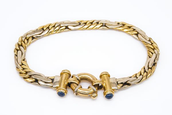 A FRENCH TWO COLOUR GOLD AND SAPPHIRE BRACELET