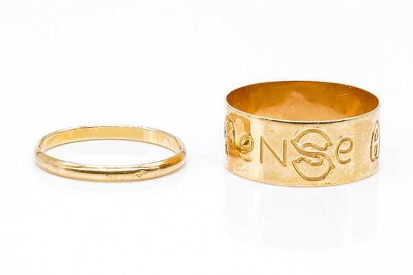 TWO GOLD WEDDING RINGS (2)