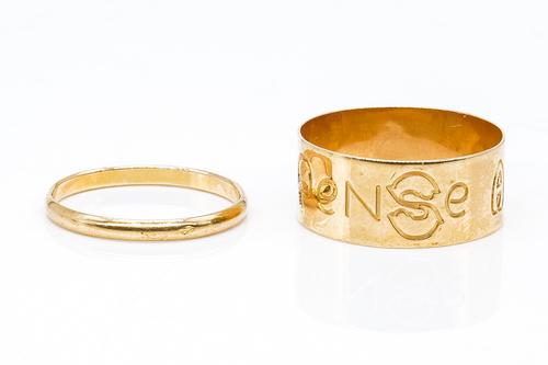 TWO GOLD WEDDING RINGS (2)