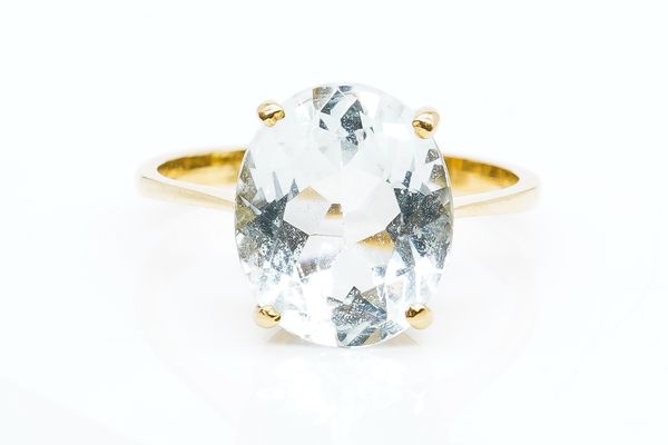 A FRENCH GOLD AND AQUAMARINE SINGLE STONE RING