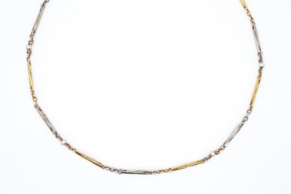 A TWO COLOUR GOLD AND SEED PEARL DRESS ALBERT CHAIN