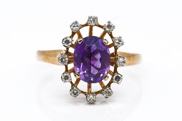 A GOLD, AMETHYST AND DIAMOND CLUSTER RING