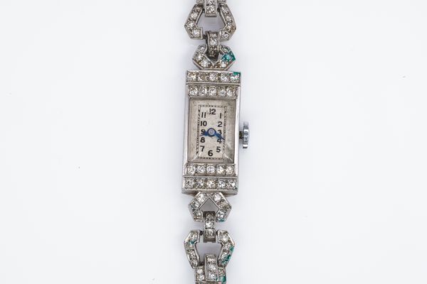 A LADY'S PLATINUM AND DIAMOND SET RECTANGULAR CASED DRESS WRISTWATCH