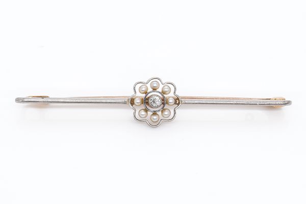 A GOLD, DIAMOND AND SEED PEARL CLUSTER BAR BROOCH