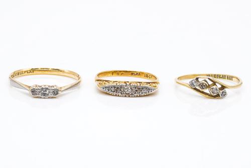 THREE GOLD AND DIAMOND RINGS (3)