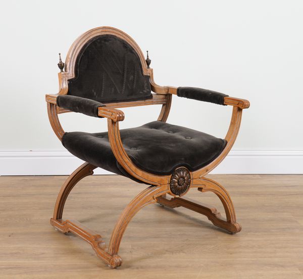 A CONTINENTAL WALNUT FRAMED X FRAME OPEN ARMCHAIR