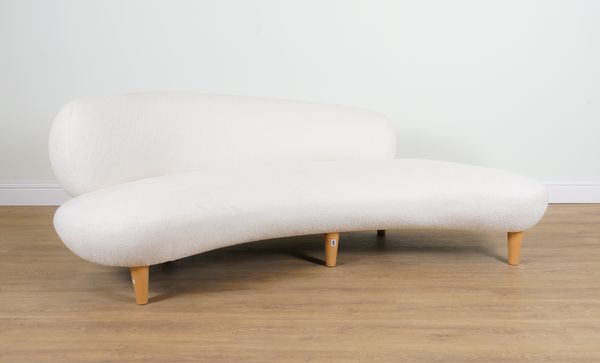 A MODERN ASYMMETRIC CONCAVE WHITE UPHOLSTERED SOFA