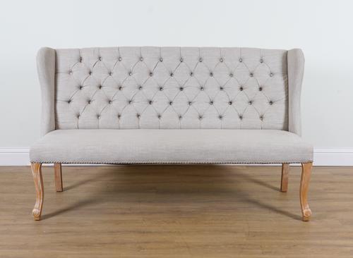 A MODERN GREY BUTTONBACK UPHOLSTERED WING BACK SOFA