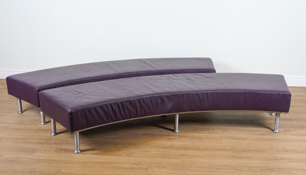 A NEAR PAIR OF MID 20TH CENTURY PURPLE LEATHER UPHOLSTERED CONCAVE BENCHES (2)