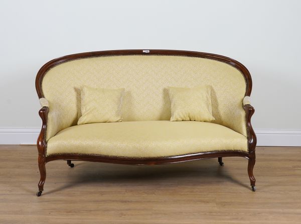 A 19TH CENTURY ROSEWOOD FRAMED SPOON BACK SOFA