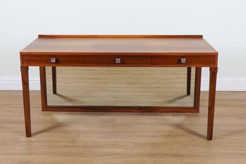 A THREE DRAWER SIDE TABLE